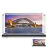 Clear display case with Sydney Harbour Bridge sunset backdrop and model of Sydney Opera House