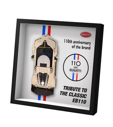 Framed LEGO-style model of classic Bugatti EB110 car with 110th anniversary tribute text and red-blue stripes