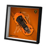 Lego orange Lamborghini model car in black frame with orange background and Lamborghini logo
