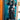 Framed black Mercedes AMG Petronas F1 car model mounted on a teal background inside a room