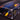 Red Bull Racing Formula 1 car model in blue and yellow displayed in clear acrylic case