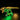 Illuminated LEGO Jurassic Park T-Rex skeleton model with green and yellow lights on black background
