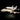 Model of NASA Space Shuttle and its carrier aircraft against a black background