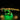LEGO Jurassic Park Tyrannosaurus Rex skeleton model lit with yellow and green LED lights on black background