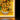 Illuminated LEGO mosaic of Vincent van Gogh's sunflower painting with glowing lights