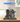 Lego Arkham Asylum model set 76300 displayed in clear protective case on wooden surface