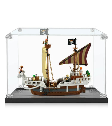 LEGO pirate ship model with minifigures inside clear display case on black base