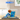 LEGO model of blue and white Nike Dunk sneaker with basketball and DUNK letters in clear display case