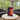Dune-themed LEGO ornithopter model displayed on white round table in modern living room