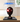 LEGO Marvel Miles Morales' Mask set 76329 displayed in a clear protective case on a wooden table
