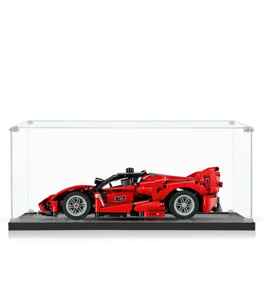 Red race car model displayed in clear acrylic showcase with black base, detailed LEGO build