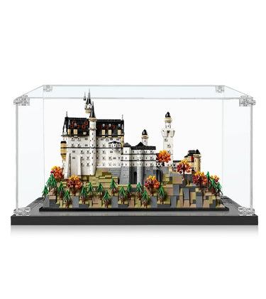 Detailed LEGO Neuschwanstein Castle model with autumn trees in clear display case