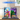 LEGO 75691 Glinda and Elphaba bookends display with pink and green books, minifigures, and themed background