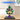 LEGO model of Prince Florian and Castle Bowser displayed in a clear acrylic case on a wooden surface