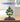 LEGO model of Prince Florian and Castle Bowser displayed in a clear acrylic case on a wooden surface