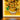 Illuminated LEGO mosaic of sunflowers in a vase with yellow and green bricks and glowing LED lights
