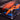 McLaren Formula 1 car model in orange and blue displayed in clear protective case