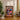 Framed Daily Bugle LEGO minifigures display on wooden desk with plants and books