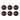 Six black circular Formula 1 Collection stand bases with logos on a white background