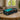 Mercedes AMG Petronas F1 car LEGO Technic model displayed in glass case on table in living room