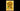 LED-lit LEGO mosaic of sunflowers in a vase with yellow background on black surface