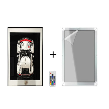 LEGO car model framed in black and white display with remote and clear acrylic frame cover
