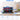 Transparent display box measuring 51cm x 24cm x 26cm with model cars inside, placed on white table