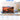 Clear acrylic display box measuring 72x35x39 cm with scenic sunset harbor image and nearby decor
