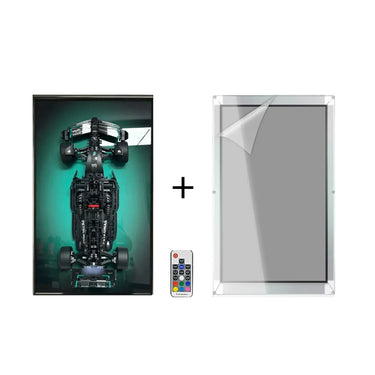 Black LEGO race car model display with LED lights, remote control, and clear protective frame