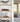 Modern living room shelves with a red Formula 1 car model and a detailed white owl display under clear cases