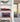 Modern room shelf with red Formula 1 car model and a display case of miniature race car models