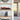 Modern living room shelves with red Formula 1 car model and Star Wars AT-ST walker LEGO display cases