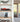 Modern living room shelves with red Formula 1 car model and Star Wars AT-ST walker LEGO display cases