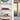 Wooden shelves with model red Formula 1 car and yellow wildlife service airplane in clear display cases