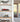 Wooden shelves with model red Formula 1 car and yellow wildlife service airplane in clear display cases