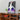 NASA space shuttle model in black frame with Boeing logo on wooden shelf with toy race cars and plant