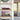 Modern living room shelves with red Formula 1 car model and LEGO Sydney Opera House display