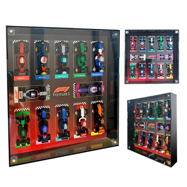 Framed display of 12 colorful Formula 1 miniature cars with team names like Ferrari, Red Bull, Mercedes, Aston Martin, Racing Bulls
