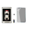 Framed LEGO Porsche model, remote control, and clear acrylic frame with protective film