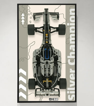 Top view of a silver and black LEGO Formula 1 model car with large tires on a beige and grey background poster labeled Silver Champion