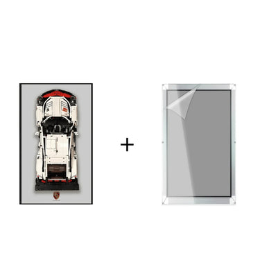 Top view of a white LEGO Porsche 911 GT3 model on a gray background with Porsche logo and a clear protective acrylic display case