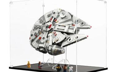 LEGO Millennium Falcon model displayed in a clear acrylic case with Star Wars minifigures