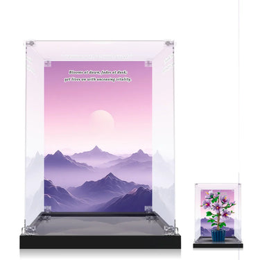 Acrylic display case with purple mountain landscape backdrop and poetic text, small flower arrangement in pot