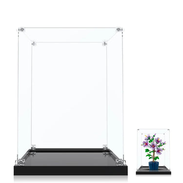 Clear acrylic display cases with black base, one empty and one with potted purple flower plant
