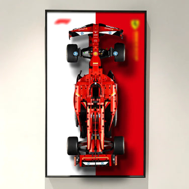 Top view of a red Ferrari Formula 1 car model on a framed red and white Ferrari flag background
