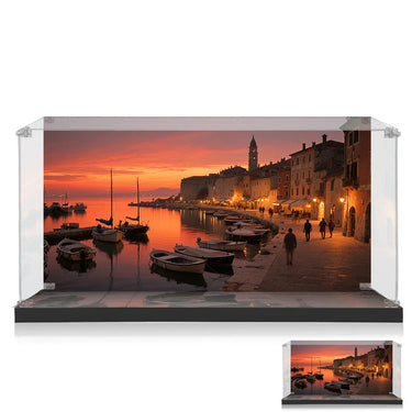 Sunset harbor scene with boats docked and illuminated waterfront village with pedestrians