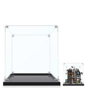 Clear acrylic display cases with black bases, one empty and one showcasing a detailed LEGO haunted mansion