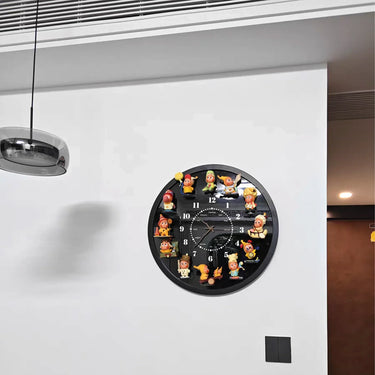 Black wall clock with colorful cartoon character figurines at each hour on white wall in modern room