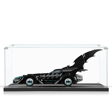 LEGO Batmobile model with iconic bat wings in clear display case on black base