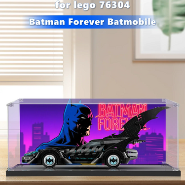 LEGO Batman Forever Batmobile model 76304 displayed in clear case with purple Batman background